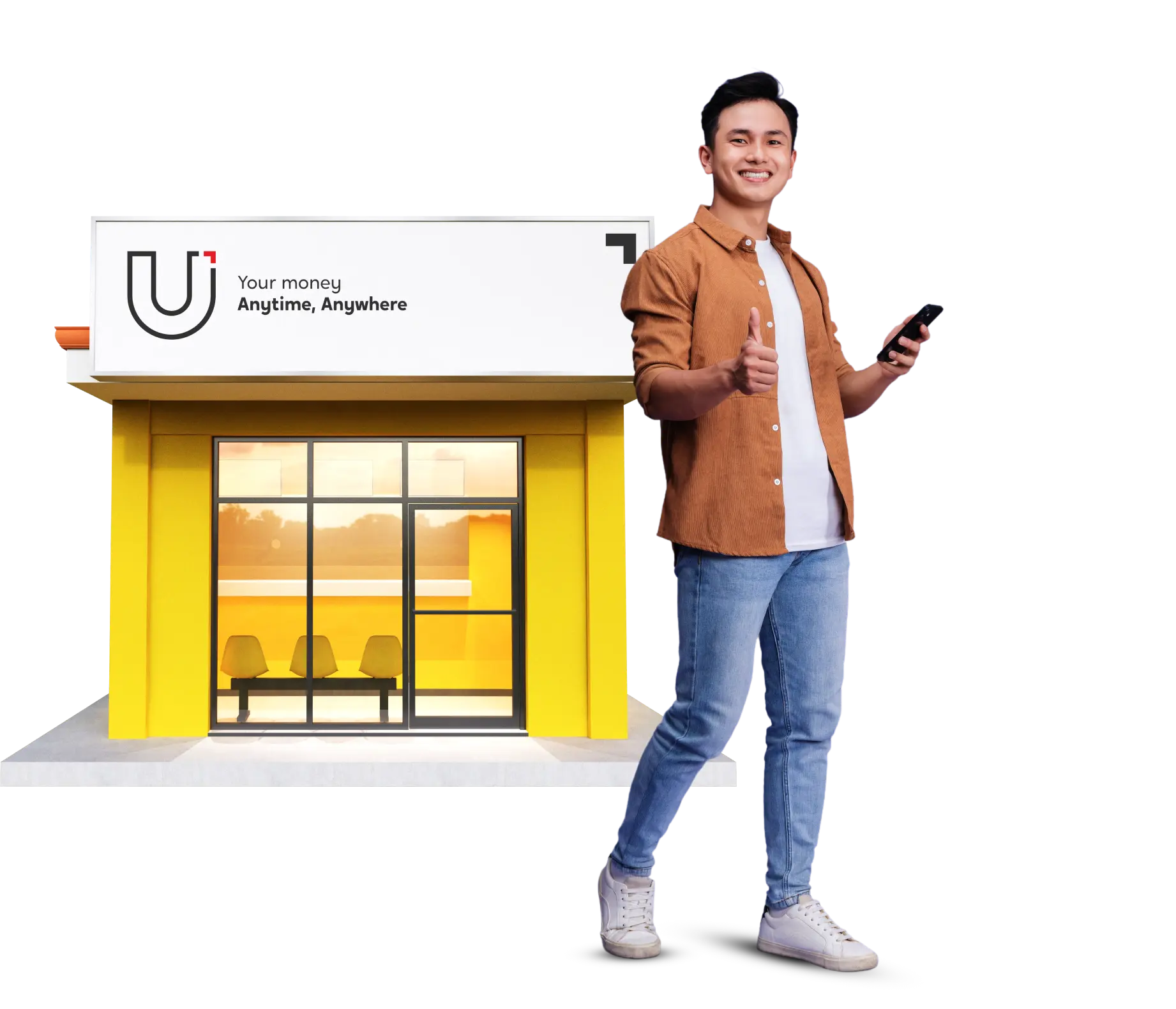 A guy outside a U Store branch holding his cellphone while making an OK sign