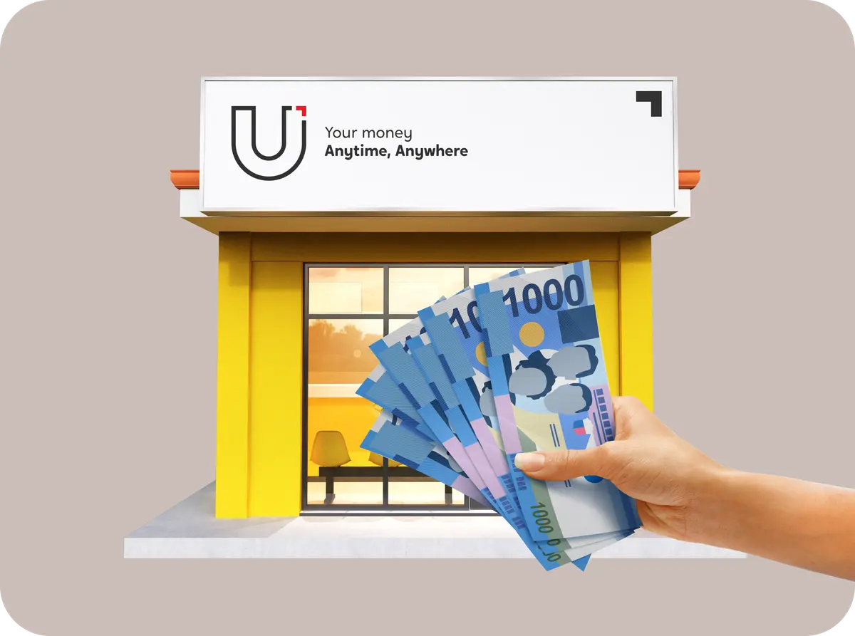 An image of the U Store with a hand holding several thousands of pesos.